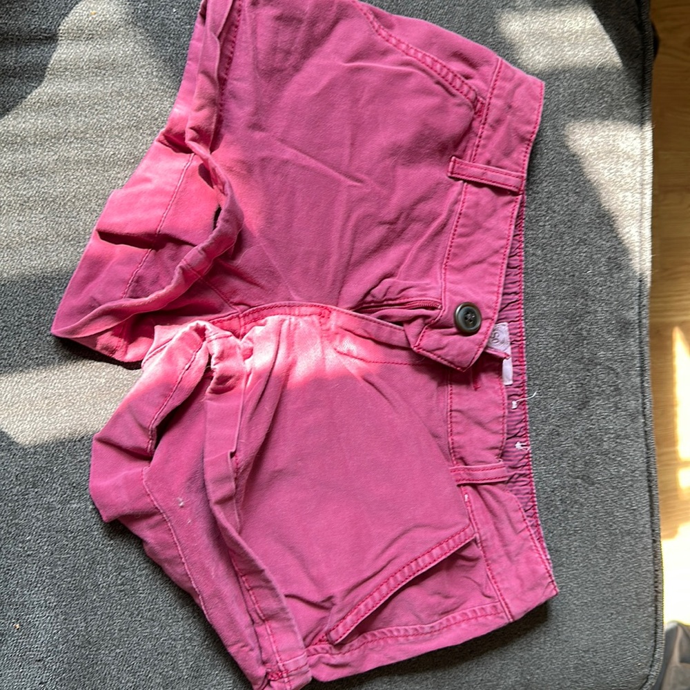 size 5 shorts in a dark pink color